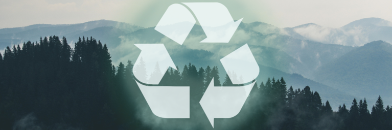 Zero Waste Header - A White Recycling Symbol over a Mountain Backdrop