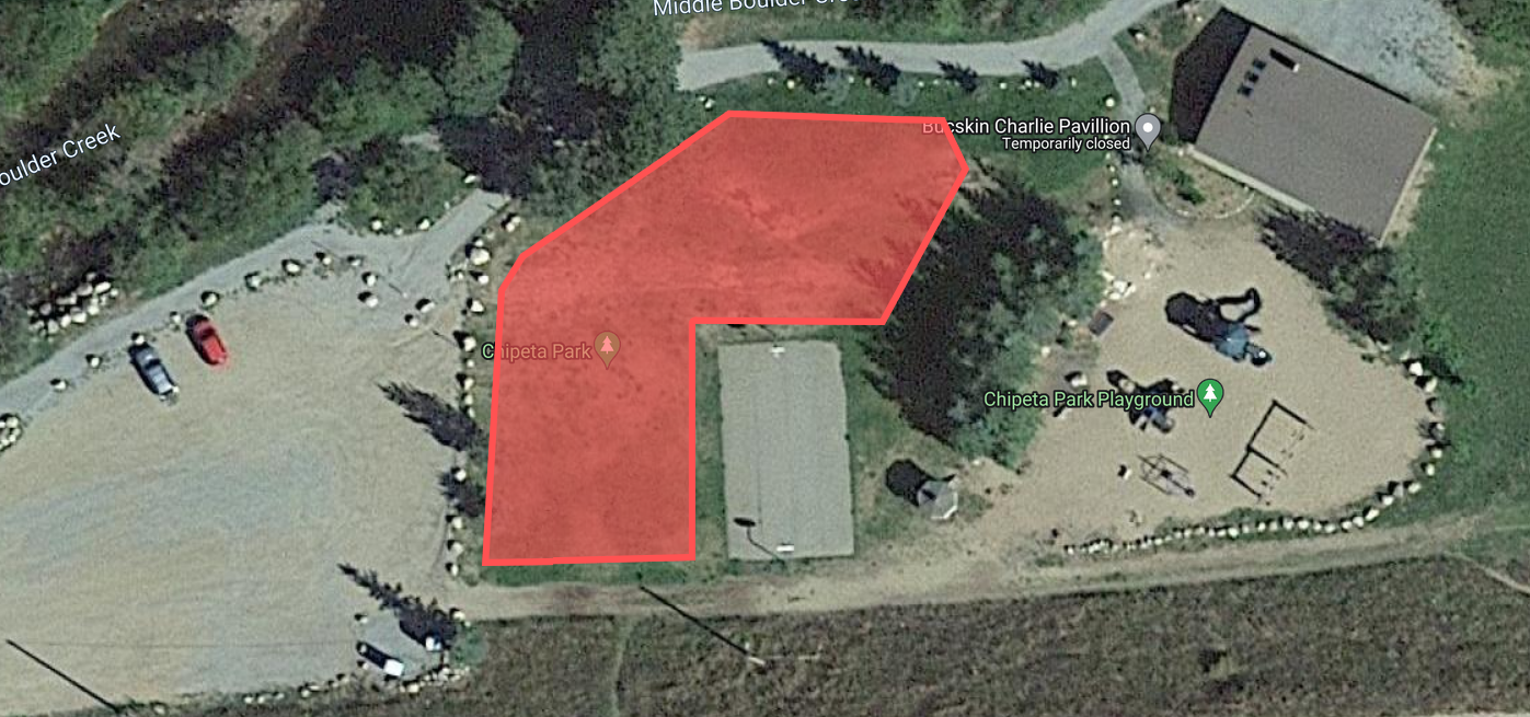 The proposed area for a pump track - located between the baseketball court and parking lot at Chipeta Park