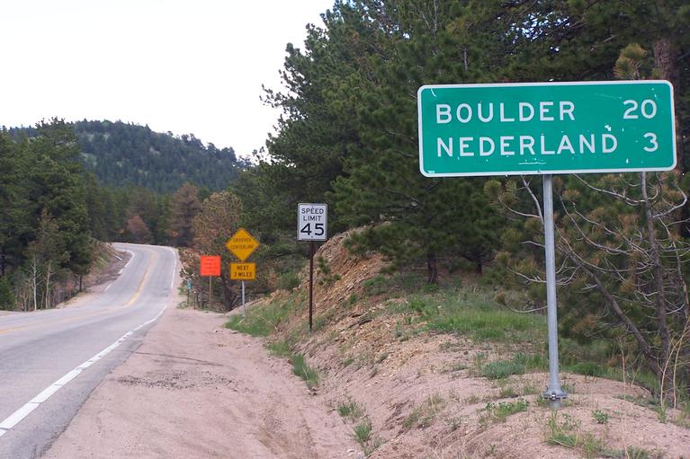 Nederland Colorado Street Sign - Three Miles